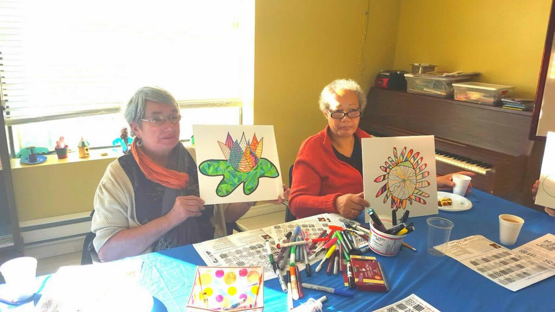 Display of art from an Art With A Heart not-for-profit group therapy session.